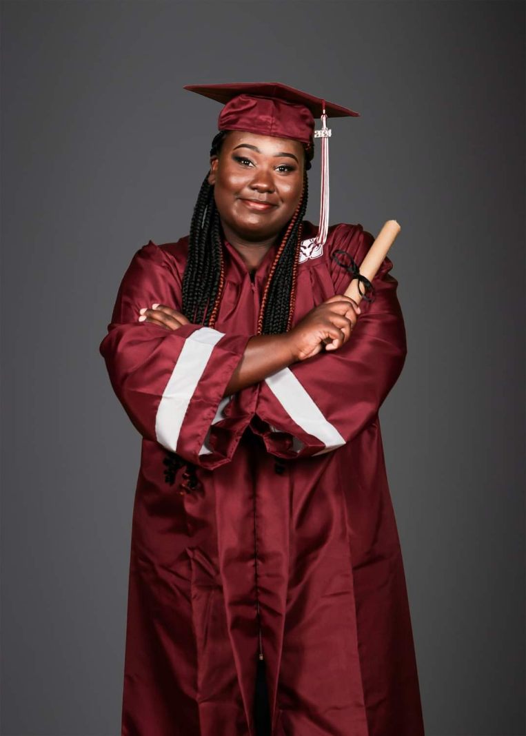 Kyla in Grad Robes